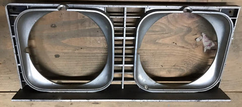 HEADLIGHT BEZEL ,RIGHT USED 73 IMPALA