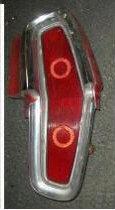 TAIL LIGHT ASSEMBLY, RH, 64 CAT STARCHIEF, HOUSING LENS BEZEL EXTENSION, USED