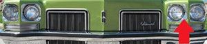 HEADLIGHT BEZEL, INNER, LEFT SIDE,  USED
