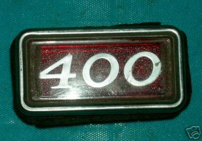 REAR MARKER LENS, 400, 69 SK GS, RED, w/OVERLAY, 400 SCRIPT, USED