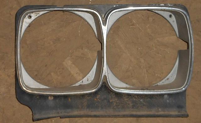 HEADLIGHT BEZEL, LEFT SIDE, USED CAST #5517