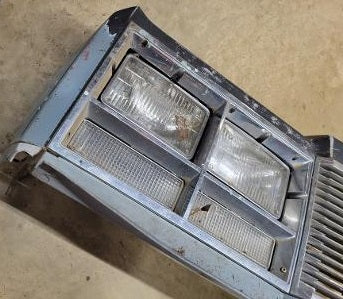 FRONT HEADER PANEL ASSEMBLY ,USED 77 OLDS DELTA 88