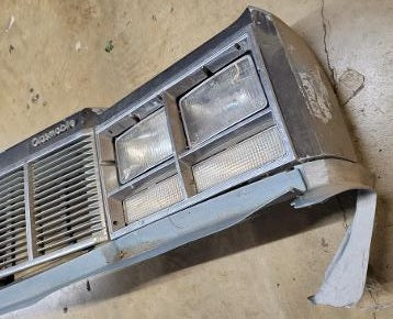 FRONT HEADER PANEL ASSEMBLY ,USED 77 OLDS DELTA 88