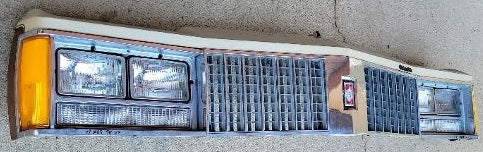 FRONT HEADER PANEL ASSMY ,USED 79 OLDS 88 98