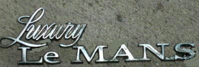 TRUNK LID EMBLEM, LUX LEMANS, 73-5 (LUXURY LEMANS} USED