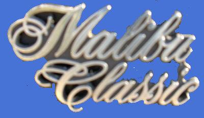 FENDER EMBLEM (MALIBU CLASSIC) 74-7 EMBLEM CAST# 345383, USED