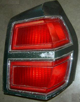 TAIL LIGHT ASSEMBLY, RH, 74 OLDS 88 & ROYALE LENS, 2 BEZELS HOUSING, USED