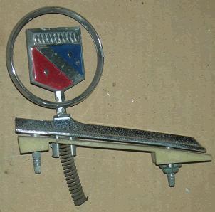 HEADER PANEL EMBLEM, 77-9 EC, w/SPRING, USED
