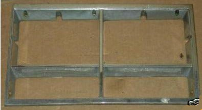 HEADLIGHT BEZEL ,LEFT,USED 77 78 DELTA  REGENCY