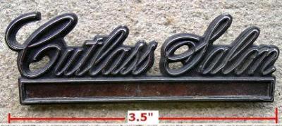 DOOR PANEL EMBLEM, CUTLASS SALON, 85 USED, EACH