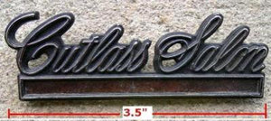 DOOR PANEL EMBLEM, CUTLASS SALON, 85 USED, EACH