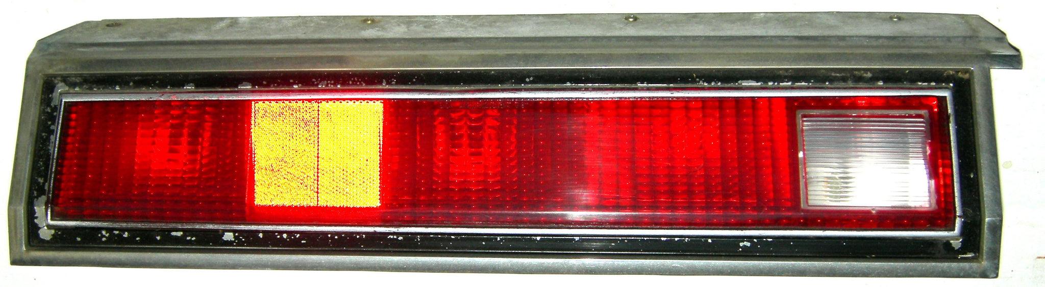 TAIL LIGHT ASSEMBLY, LH, 78 RE, USED, LEN BEZEL HOUSING CHROME BEZEL