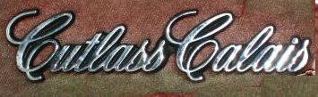DOOR PANEL EMBLEM, CUTLASS CALAIS, 82-4 USED,  EACH