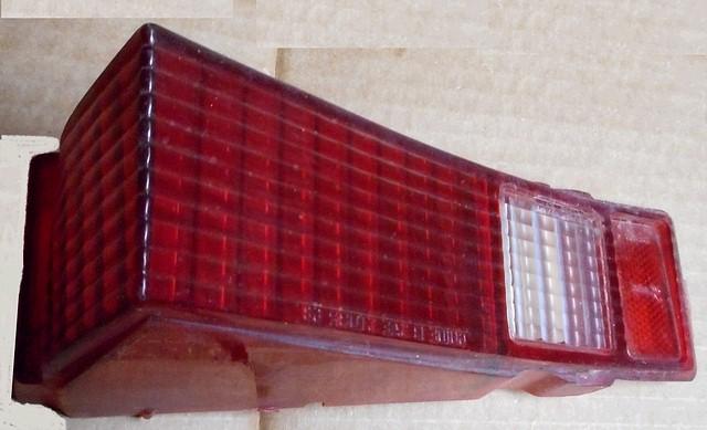 TAIL & BACKUP LIGHT LENS, LH, 300 DLX, USED
