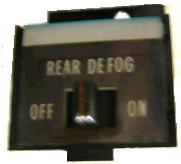 REAR DEFOGGER SWITCH ,USED 71-3 CADILLAC