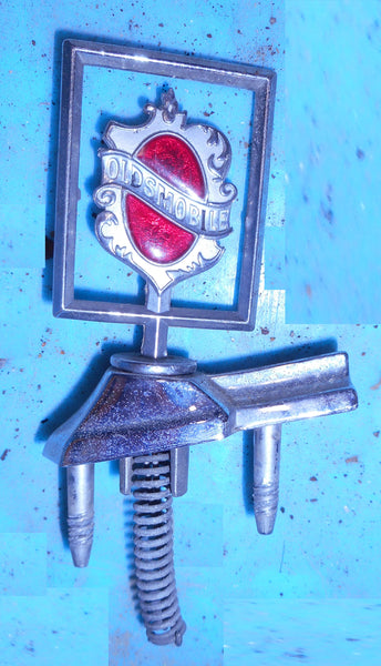 HEADER PANEL EMBLEM ,USED 82-90 OLDS 88 98