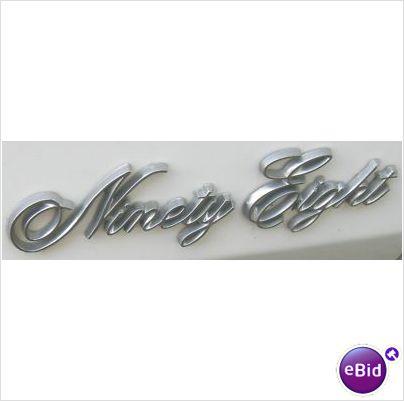 QUARTER EMBLEM, "NINETY EIGHT" 75-6 OLDS 9,8  USED