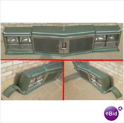 GRILLE HEADER PANEL ASSEMBLY, 77 OLDS 98, USED