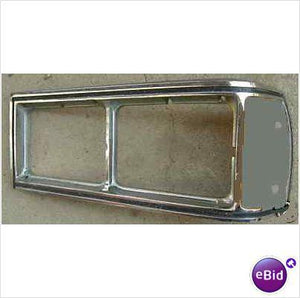 HEADLIGHT BEZEL OR DOOR  RH  USED