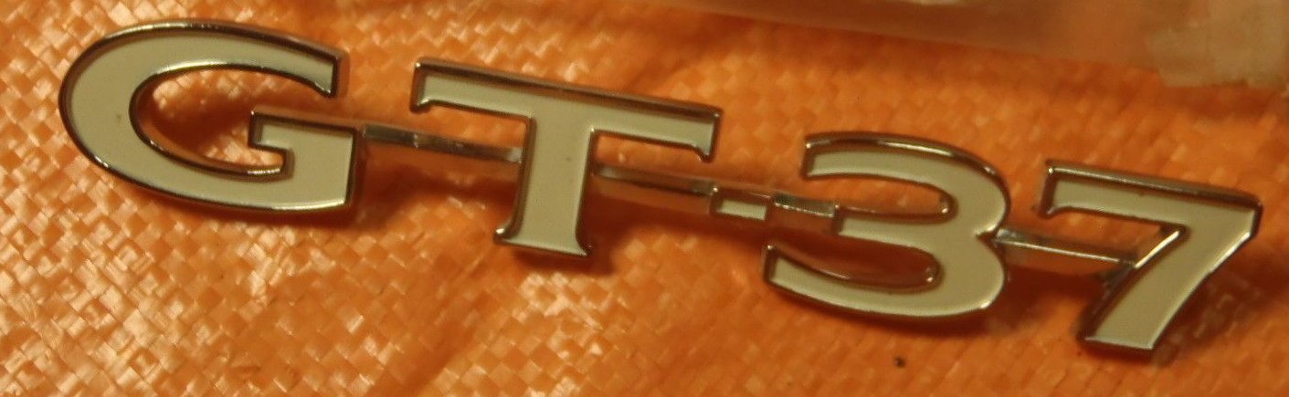 ROCKER OR FENDER EMBLEM, (GT-37) NEW, EACH, 70-71 LEMANS