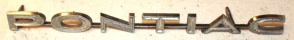 GRILLE EMBLEM " PONTIAC "USED 69 LEMANS TEMPEST